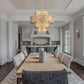 Z-Lite Dealey 26" 13-Light Heirloom Brass Pendant Light With Steel and Crystal Shade