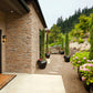 Z-Lite Dunbroch 8" W x 18" H 1-Light Deep Bronze and Outdoor Brass Aluminum Outdoor Wall Sconce With Clear Glass Shade