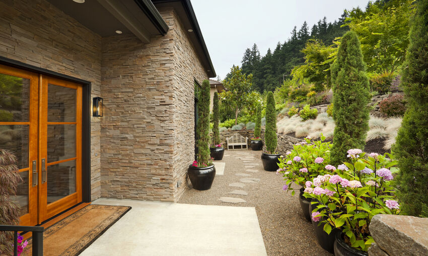 Z-Lite Dunbroch 8" W x 18" H 1-Light Deep Bronze and Outdoor Brass Aluminum Outdoor Wall Sconce With Clear Glass Shade