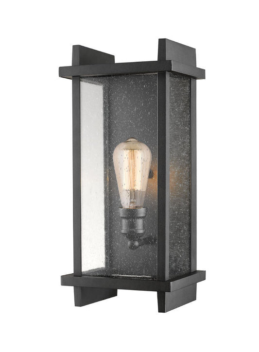 Z-Lite Fallow 8" 1-Light Black Outdoor Wall Sconce With Clear Seedy Glass Shade