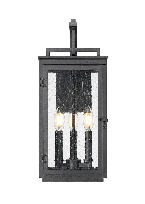 Z-Lite Hartwell 3-Light Candelabra Sand Black Aluminum Frame Clear Seedy Glass Shade Outdoor Wall Light