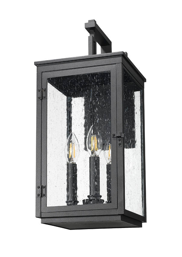 Z-Lite Hartwell 3-Light Candelabra Sand Black Aluminum Frame Clear Seedy Glass Shade Outdoor Wall Light