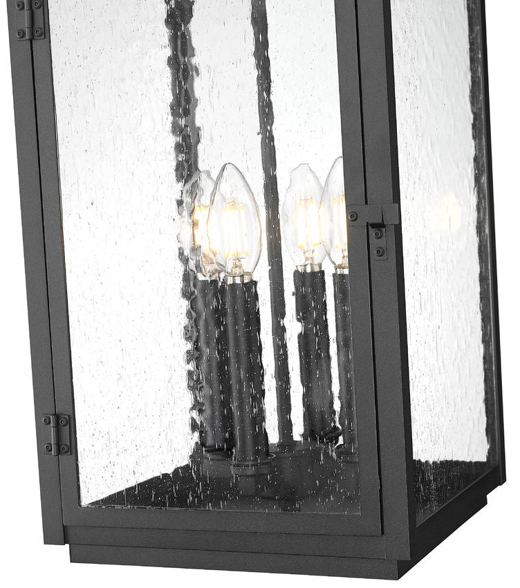 Z-Lite Hartwell 4-Light Candelabra Sand Black Aluminum Frame Clear Seedy Glass Shade Outdoor Chain Mount Ceiling Fixture