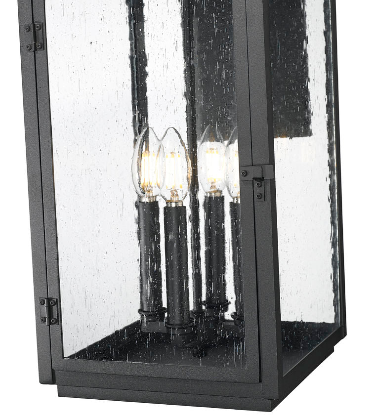 Z-Lite Hartwell 4-Light Candelabra Sand Black Aluminum Frame Clear Seedy Glass Shade Outdoor Wall Light