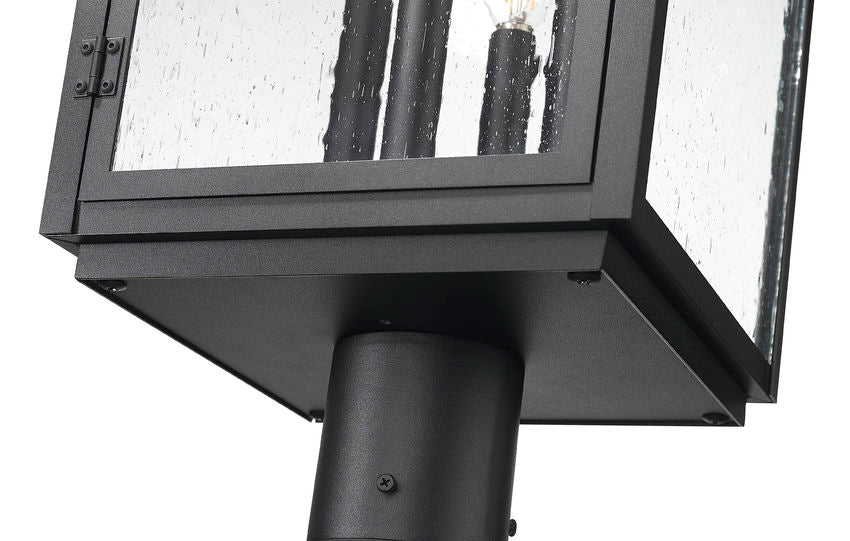 Z-Lite Hartwell 5019PHBR-519P-BK 4-Light Candelabra Bulb Base Sand Black Aluminum Clear Seedy Glass Shade Outdoor Post Mounted Fixture