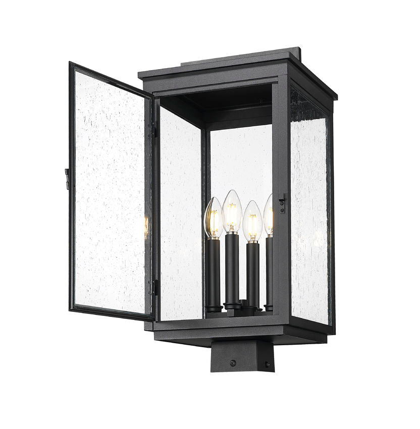 Z-Lite Hartwell 5019PHBS-BK 4-Light Candelabra Bulb Base Sand Black Aluminum Clear Seedy Glass Shade Outdoor Post Mount Fixture