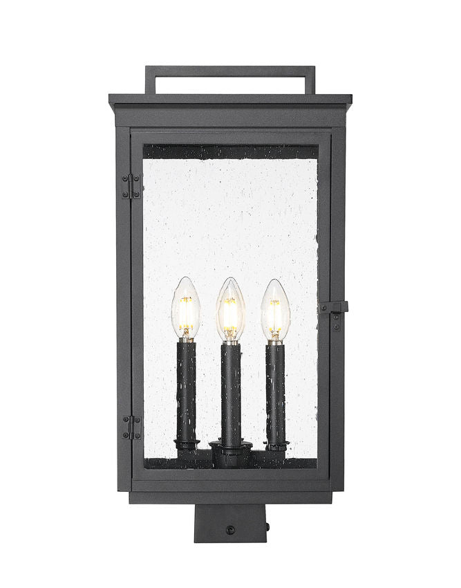 Z-Lite Hartwell 5019PHBS-BK 4-Light Candelabra Bulb Base Sand Black Aluminum Clear Seedy Glass Shade Outdoor Post Mount Fixture