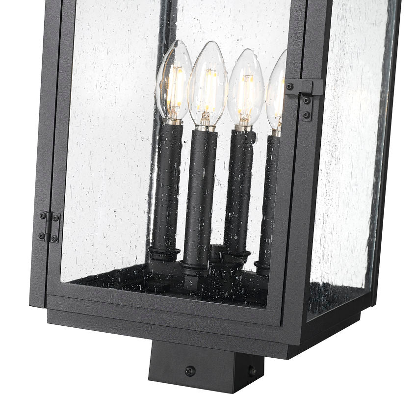 Z-Lite Hartwell 5019PHBS-BK 4-Light Candelabra Bulb Base Sand Black Aluminum Clear Seedy Glass Shade Outdoor Post Mount Fixture