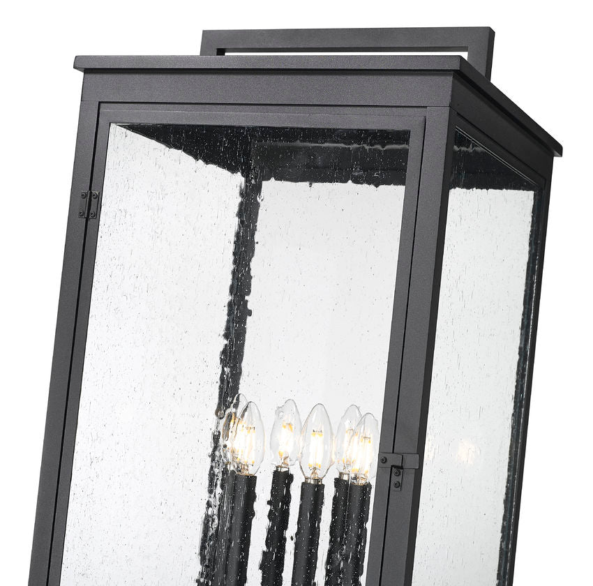 Z-Lite Hartwell 5019PHXXLS-536P-BK 6-Light Candelabra Bulb Base Sand Black Aluminum Clear Seedy Glass Shade Outdoor Post Mounted Fixture