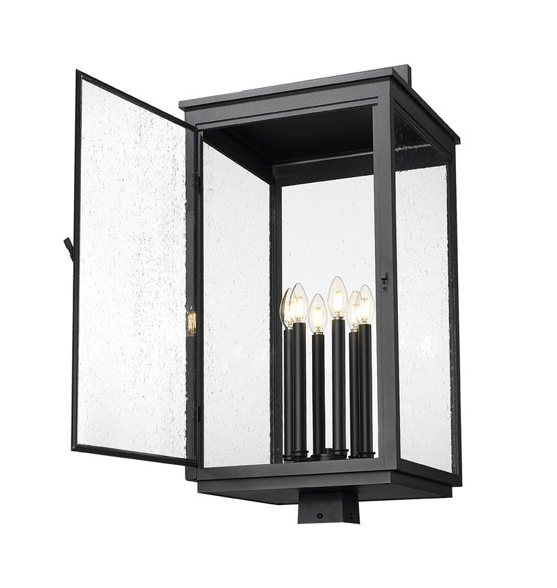 Z-Lite Hartwell 5019PHXXLS-BK 6-Light Candelabra Bulb Base Sand Black Aluminum Clear Seedy Glass Shade Outdoor Post Mounted Fixture