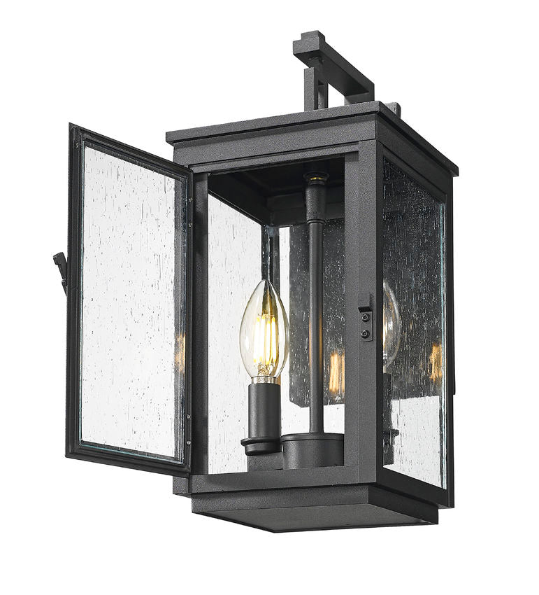 Z-Lite Hartwell 5019S-BK 2-Light Candelabra Bulb Base Sand Black Aluminum Clear Seedy Glass Shade Outdoor Wall Light