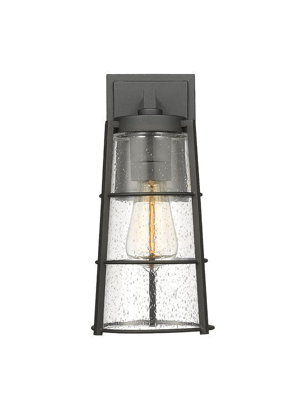 Z-Lite Helix 6" W x 13" H 1-Light Black Aluminum Outdoor Wall Sconce With Clear Seedy Glass Shade