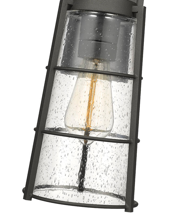 Z-Lite Helix 6" W x 13" H 1-Light Black Aluminum Outdoor Wall Sconce With Clear Seedy Glass Shade