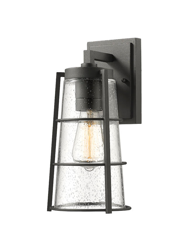 Z-Lite Helix 6" W x 13" H 1-Light Black Aluminum Outdoor Wall Sconce With Clear Seedy Glass Shade