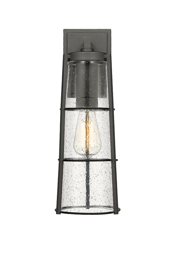 Z-Lite Helix 6" W x 17" H 1-Light Black Aluminum Outdoor Wall Sconce With Clear Seedy Glass Shade