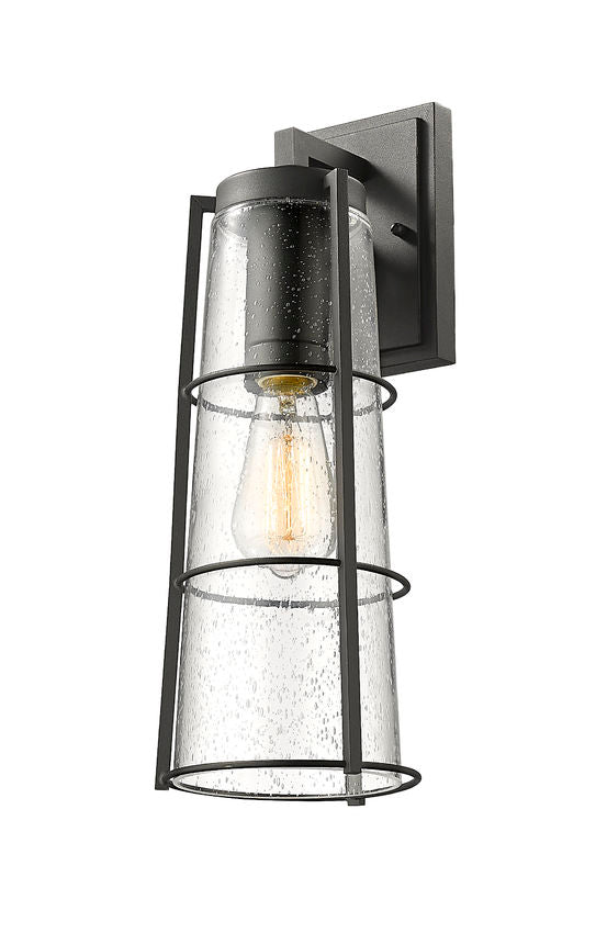 Z-Lite Helix 6" W x 17" H 1-Light Black Aluminum Outdoor Wall Sconce With Clear Seedy Glass Shade