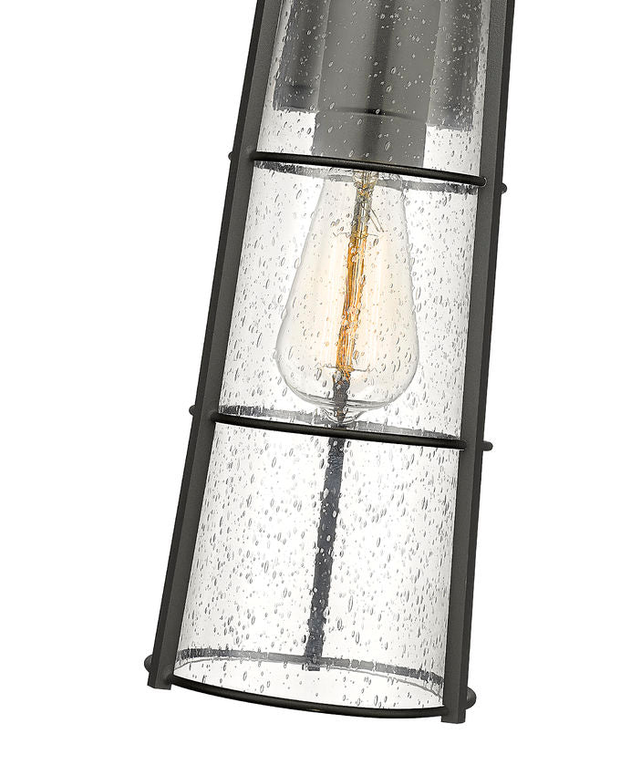 Z-Lite Helix 6" W x 17" H 1-Light Black Aluminum Outdoor Wall Sconce With Clear Seedy Glass Shade