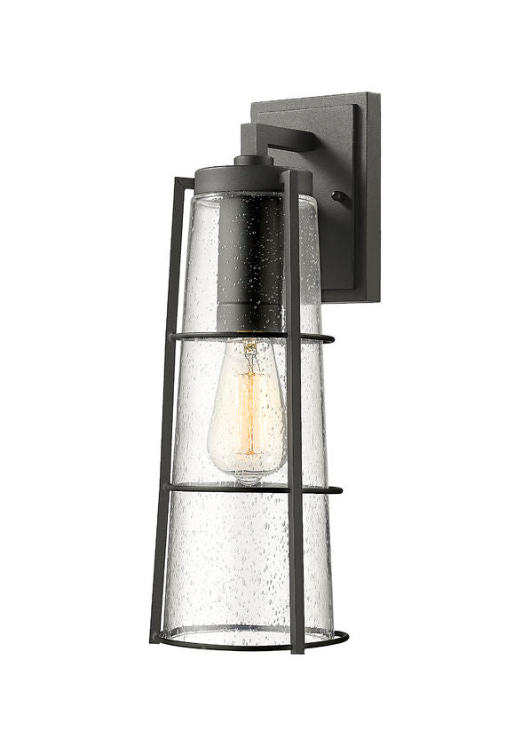 Z-Lite Helix 6" W x 17" H 1-Light Black Aluminum Outdoor Wall Sconce With Clear Seedy Glass Shade