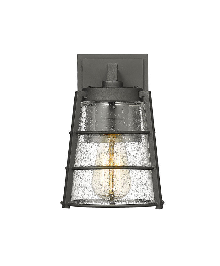 Z-Lite Helix 6" W x 9" H 1-Light Black Aluminum Outdoor Wall Sconce With Clear Seedy Glass Shade