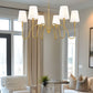 Z-Lite Jisele 42" 6-Light Rubbed Brass Steel Frame White Linen Shade Chandelier