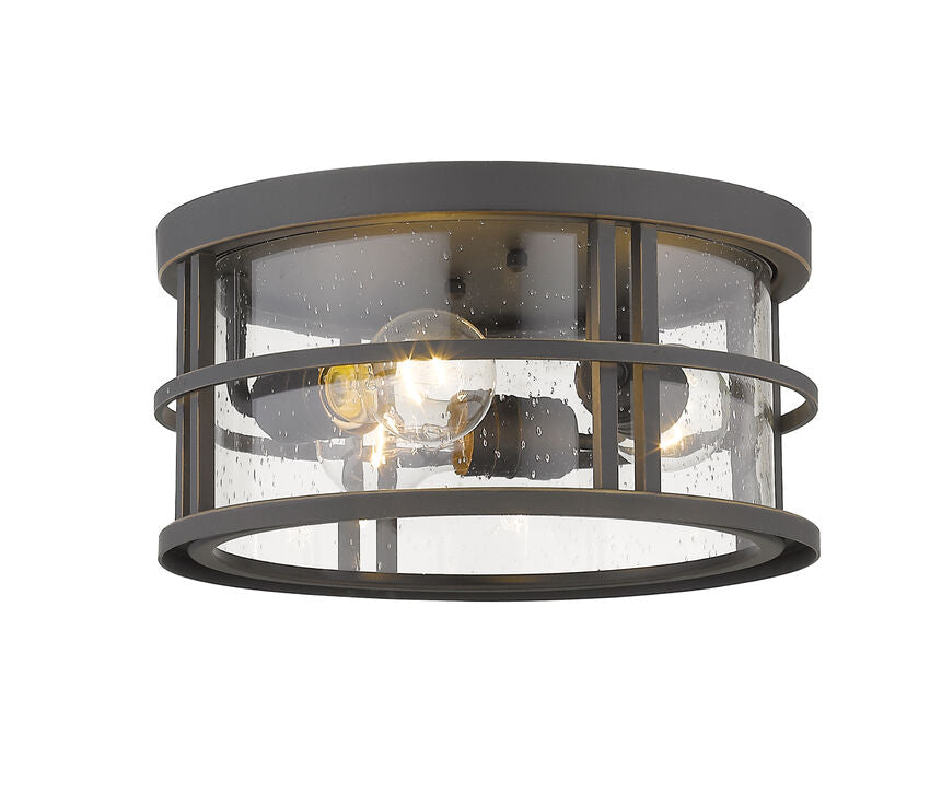 Z-Lite Jordan 12" 3-Light Oil Rubbed Bronze Aluminum Outdoor Flush Mount With Clear Seedy Glass Shade