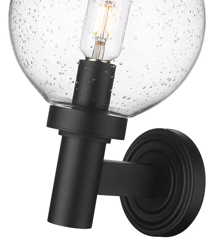 Z-Lite Laurent 8" 1-Light Black Aluminum Outdoor Wall Sconce With Clear Seedy Glass Shade