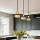 Z-Lite Ludo 12" 3-Light LED-Integrated Matte Black and Modern Gold Steel Frame Frosted Acrylic Shade Linear Chandelier