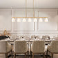 Z-Lite Naya 7-Light Medium Bulb Base Modern Gold Steel Frame Matte Opal Glass Shade Linear Chandelier