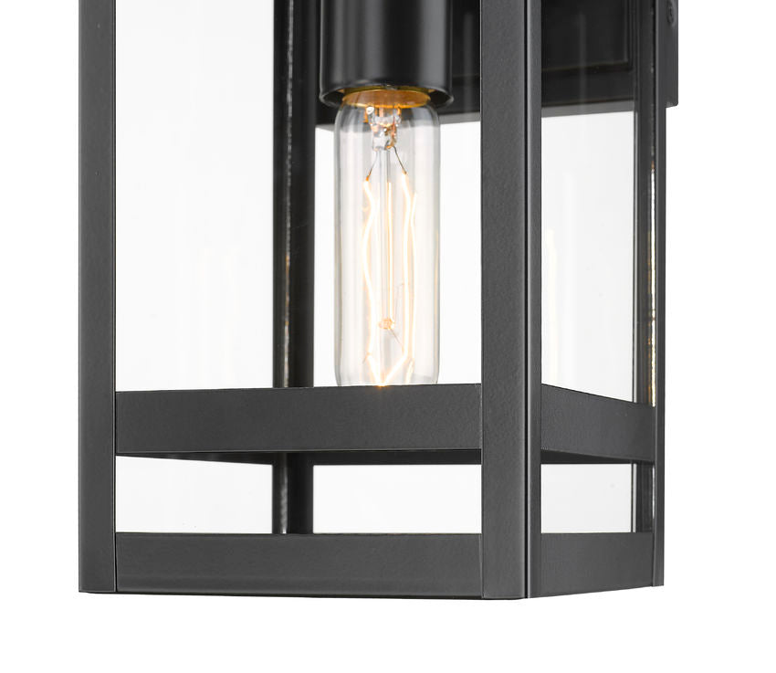 Z-Lite Nuri 7" W x 14" H 1-Light Black Aluminum Outdoor Wall Sconce With Clear Glass Shade