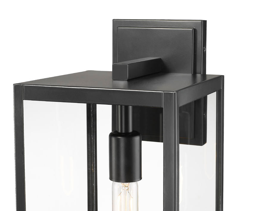 Z-Lite Nuri 8" W x 18" H 1-Light Black Aluminum Outdoor Wall Sconce With Clear Glass Shade