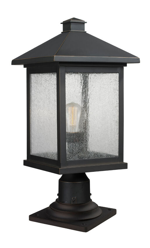 Z-Lite Portland 10" 1-Light Oil Rubbed Bronze Outdoor Pier Mounted Fixture With Clear Seedy Glass Shade and Square Pier Mount Hardware