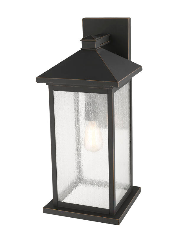 Z-Lite Portland 10" W x 22" H 1-Light Oil Rubbed Bronze Aluminum Outdoor Wall Sconce With Clear Seedy Glass Shade