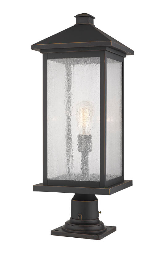Z-Lite Portland 10" W x 26" H 1-Light Oil Rubbed Bronze Outdoor Pier Mounted Fixture and Square Pier Mount Hardware With Clear Seedy Glass Shade