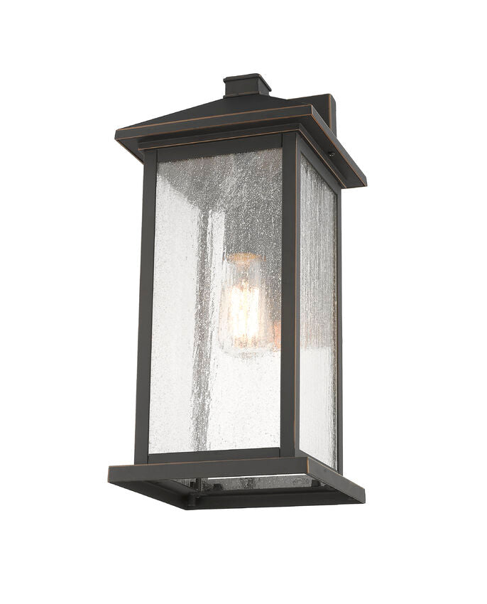 Z-Lite Portland 8" W x 18" H 1-Light Oil Rubbed Bronze Aluminum Outdoor Wall Sconce With Clear Seedy Glass Shade