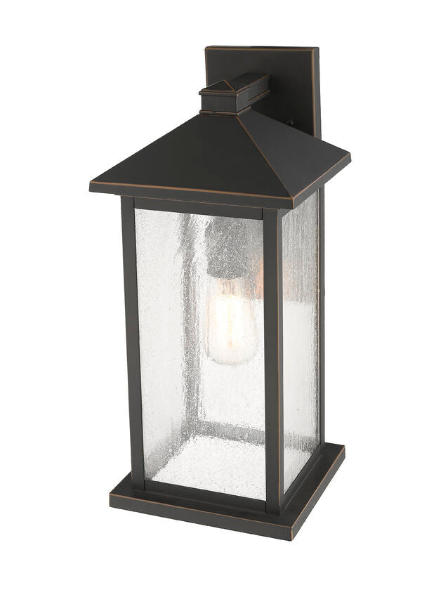 Z-Lite Portland 8" W x 18" H 1-Light Oil Rubbed Bronze Aluminum Outdoor Wall Sconce With Clear Seedy Glass Shade