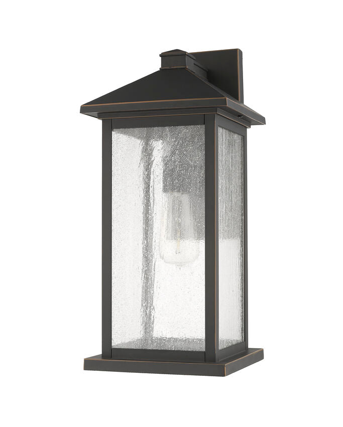 Z-Lite Portland 8" W x 18" H 1-Light Oil Rubbed Bronze Aluminum Outdoor Wall Sconce With Clear Seedy Glass Shade