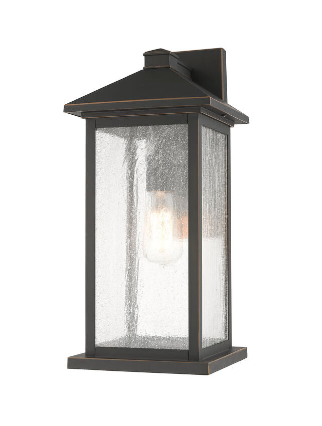 Z-Lite Portland 8" W x 18" H 1-Light Oil Rubbed Bronze Aluminum Outdoor Wall Sconce With Clear Seedy Glass Shade