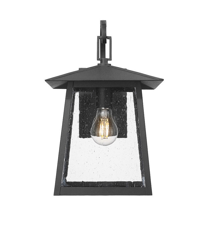 Z-Lite Rainer 10" 1-Light Black Aluminum Outdoor Wall Light With Clear Seedy Glass Shade