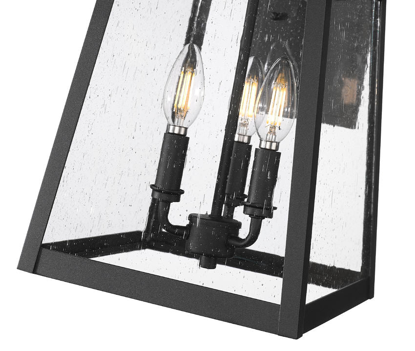 Z-Lite Rainer 12" 3-Light Black Aluminum Outdoor Wall Light With Clear Seedy Glass Shade