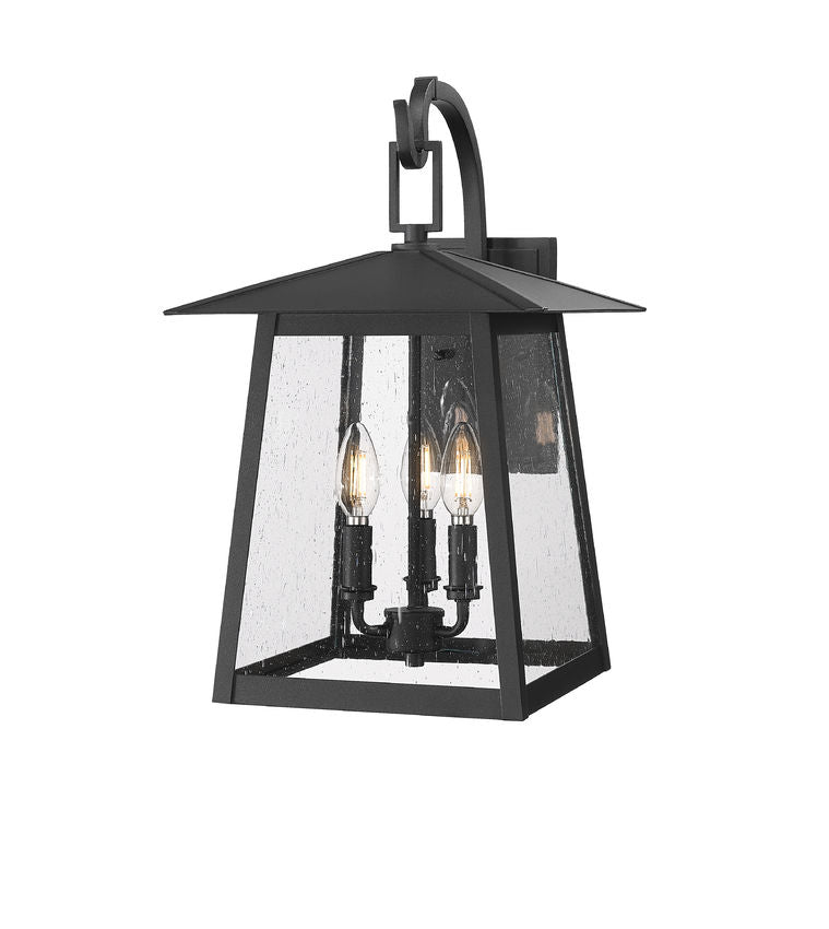 Z-Lite Rainer 12" 3-Light Black Aluminum Outdoor Wall Light With Clear Seedy Glass Shade