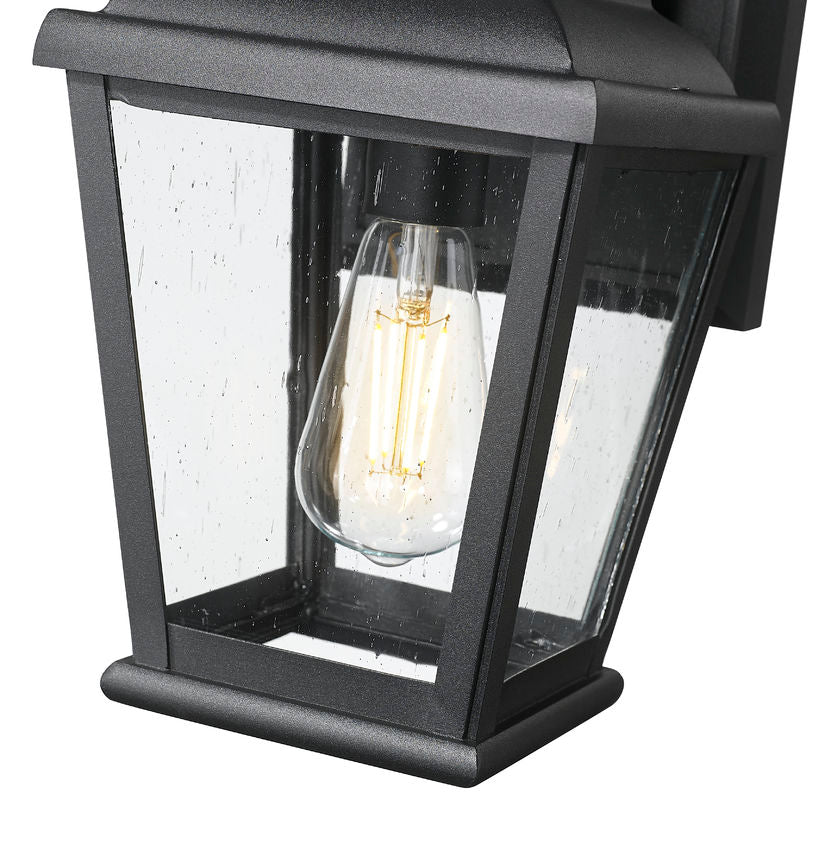 Z-Lite Raphael 5029S-BK 1-Light Sand Black Aluminum Frame Clear Seedy Glass Shade Outdoor Wall Light