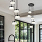 Z-Lite Renaud 16" 5-Light LED-Integrated Matte Black Steel Frame Feathered White Glass Shade Chandelier