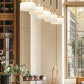 Z-Lite Renaud 7" 5-Light LED-Integrated Modern Gold Steel Frame Feathered White Glass Shade Linear Chandelier