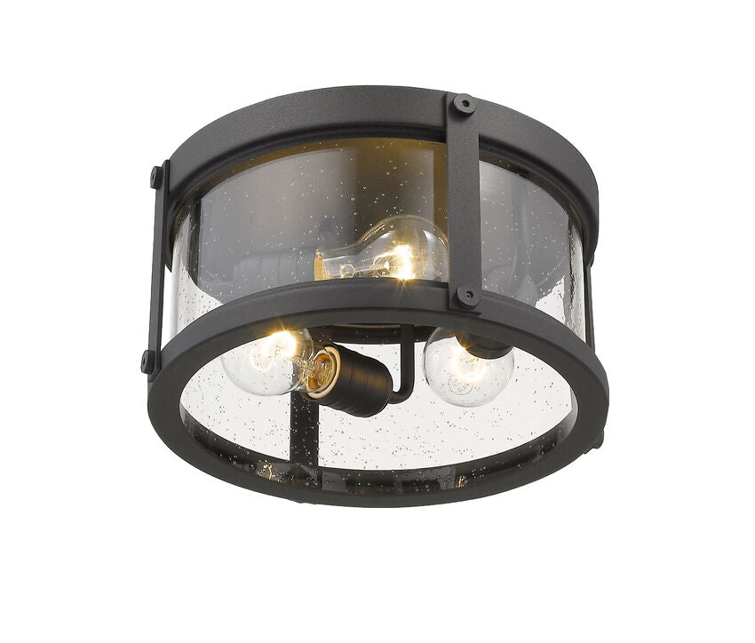 Z-Lite Roundhouse 12" 3-Light Black Aluminum Outdoor Flush Mount With Clear Seedy Glass Shade