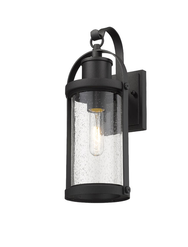 Z-Lite Roundhouse 6" 1-Light Black Outdoor Wall Sconce With Clear Seedy Glass Shade