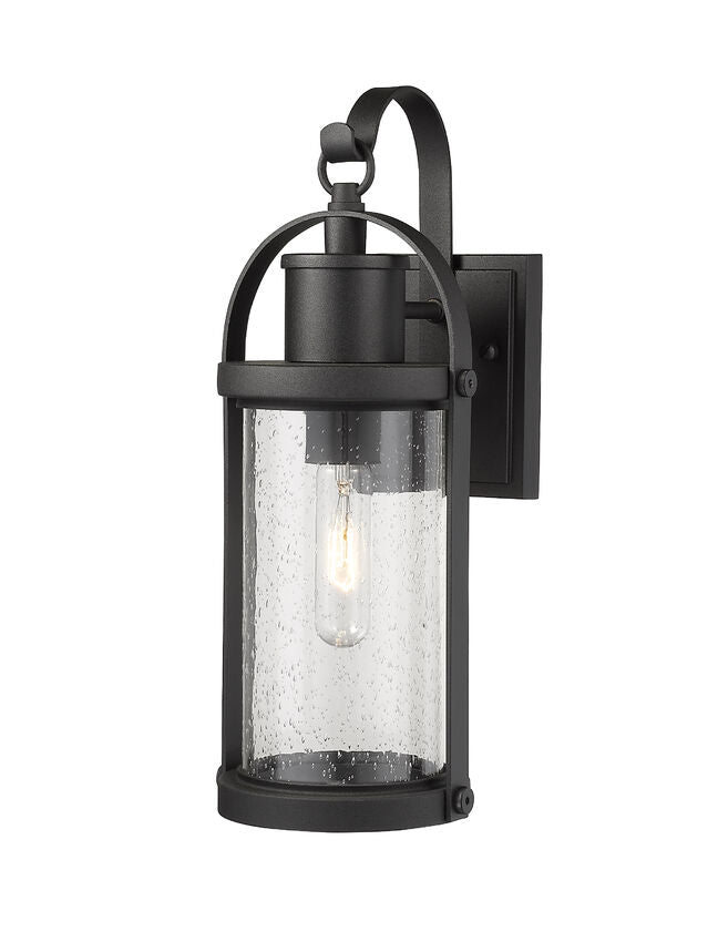 Z-Lite Roundhouse 6" 1-Light Black Outdoor Wall Sconce With Clear Seedy Glass Shade