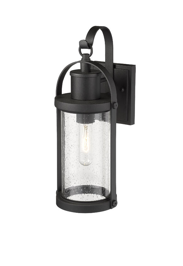 Z-Lite Roundhouse 6" 1-Light Black Outdoor Wall Sconce With Clear Seedy Glass Shade