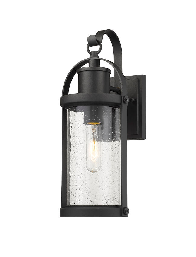 Z-Lite Roundhouse 6" 1-Light Black Outdoor Wall Sconce With Clear Seedy Glass Shade