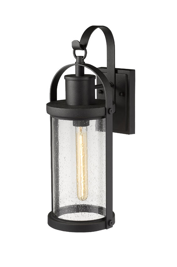 Z-Lite Roundhouse 8" 1-Light Black Outdoor Wall Sconce With Clear Seedy Glass Shade