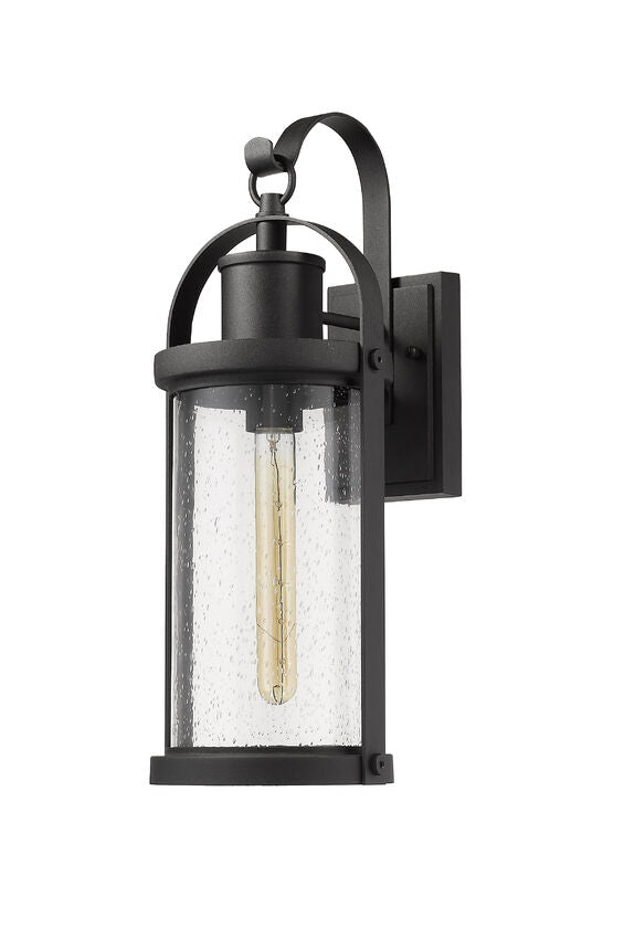 Z-Lite Roundhouse 8" 1-Light Black Outdoor Wall Sconce With Clear Seedy Glass Shade